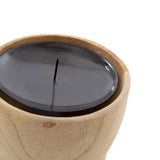 Candle in a wooden holder on a white background