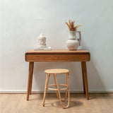 Natural rattan stool with woven seating surface