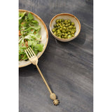 White stoneware sauce bowl with amber rim
