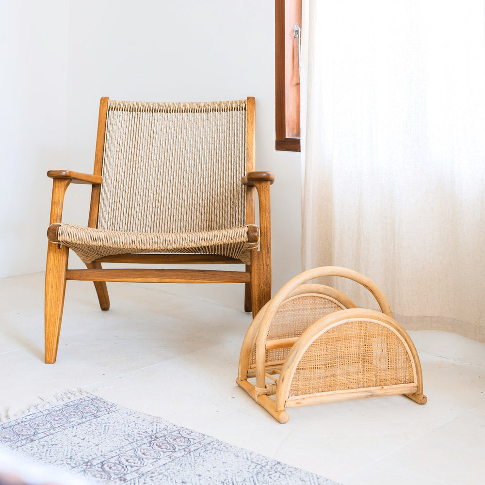 Beige woven rattan newspaper rack with handle