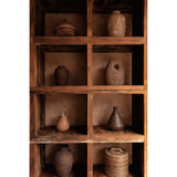 Wooden shelf with various ceramic pots and vases on a white background