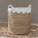 White woven seagrass storage basket with handles