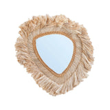 Beige round grass-framed mirror