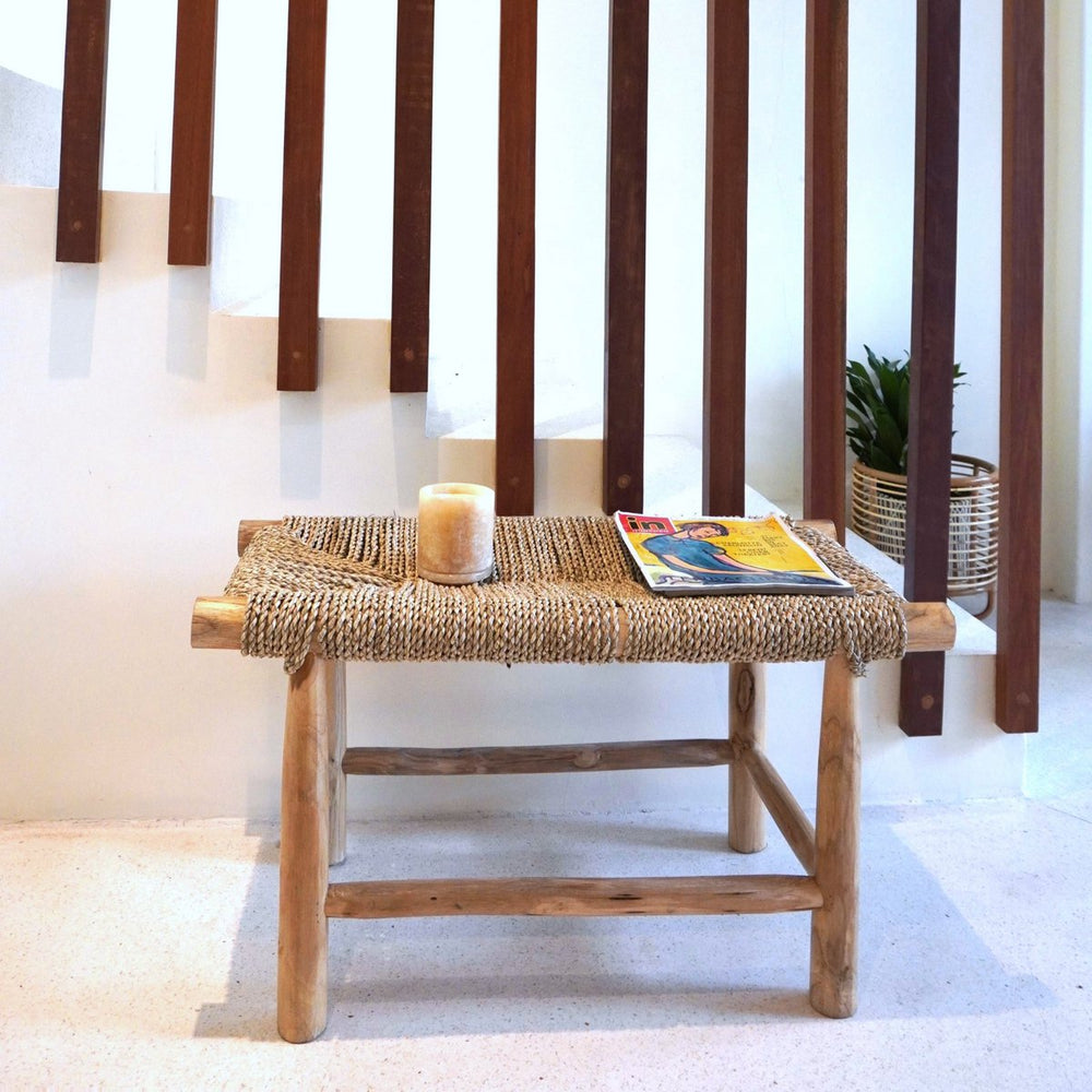 Beige wood bench with woven seagrass seat