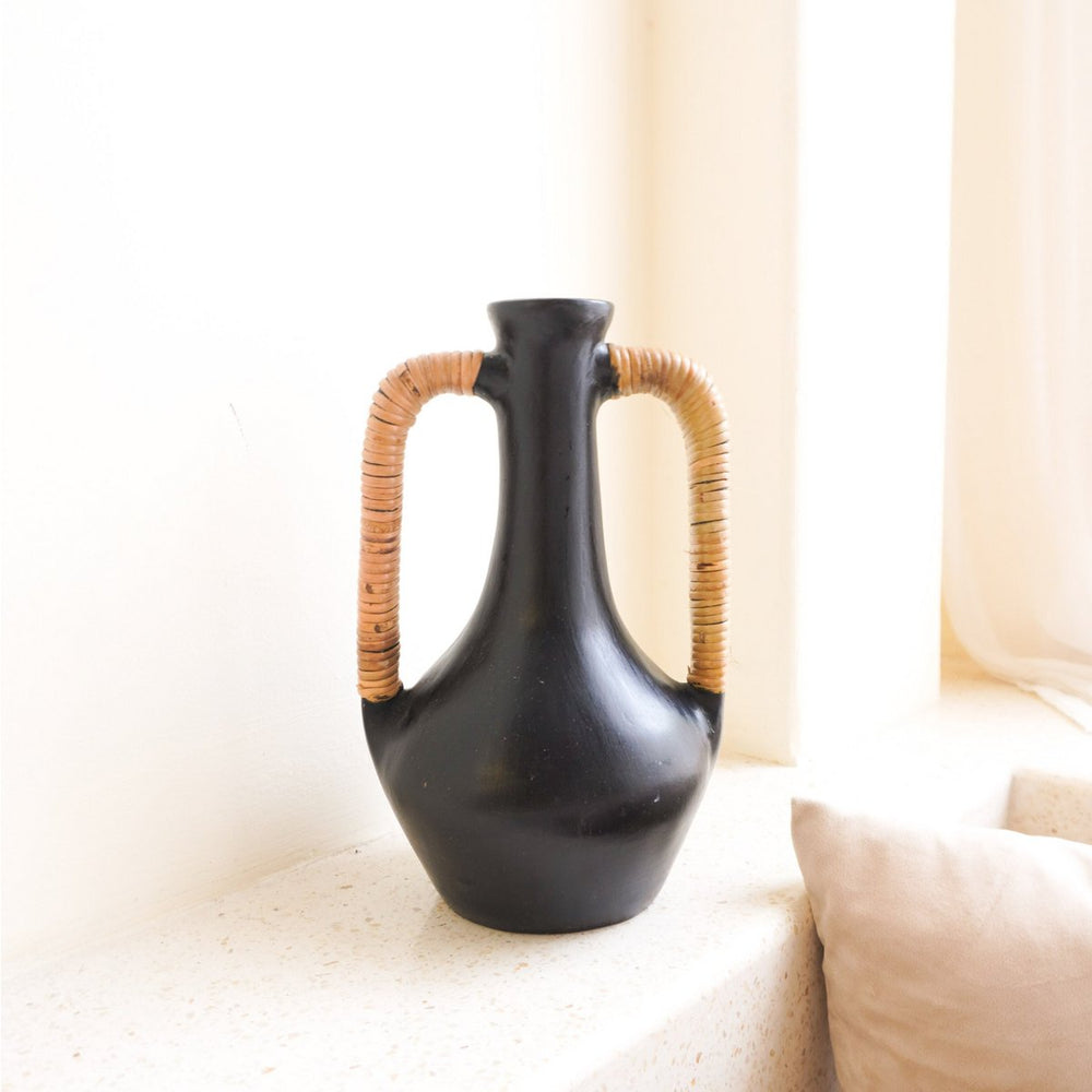 Black clay bottle vase with rattan-wrapped handles
