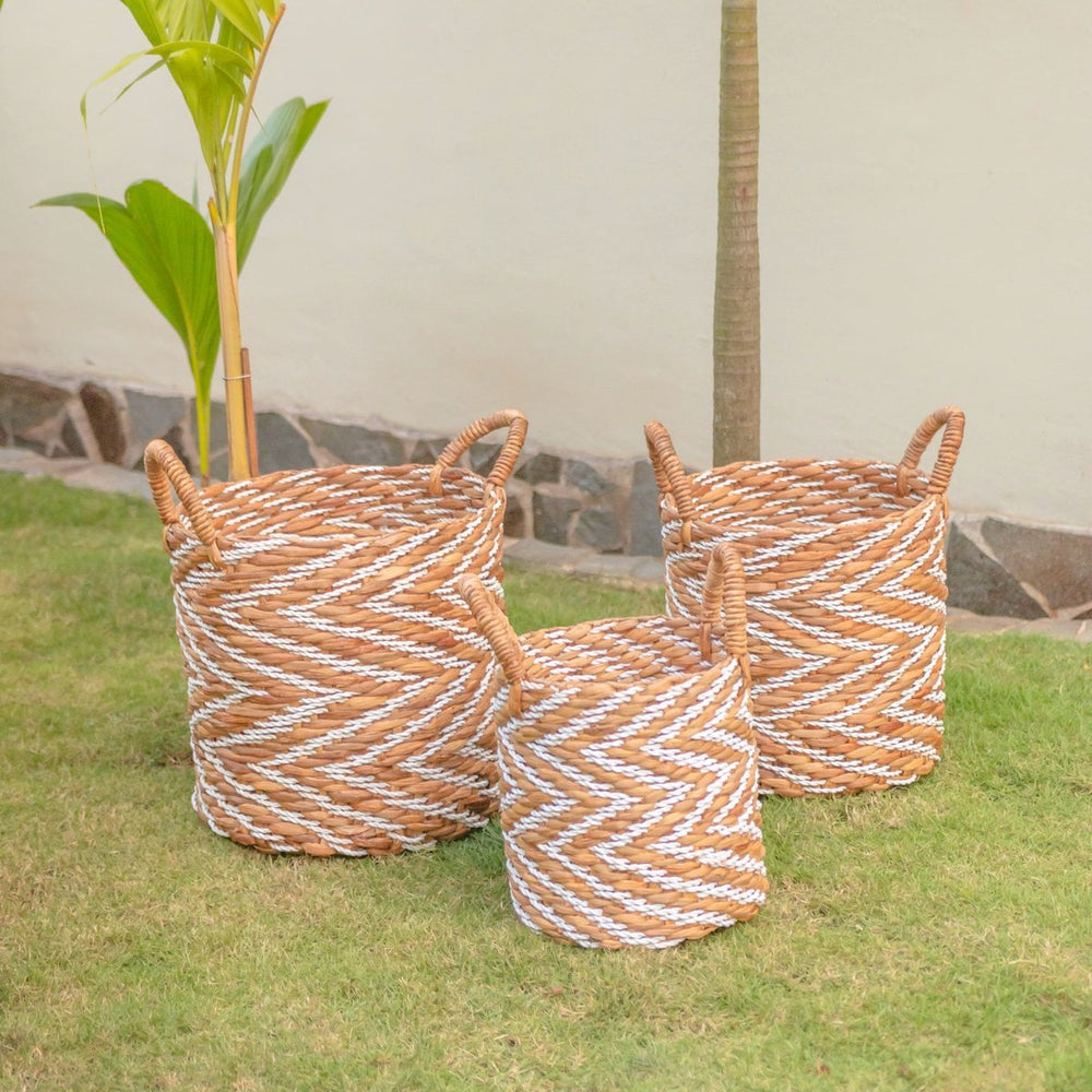 White and beige woven water hyacinth basket with striped pattern