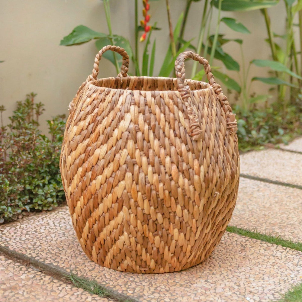 Beige and brown woven water hyacinth basket with zig zag pattern