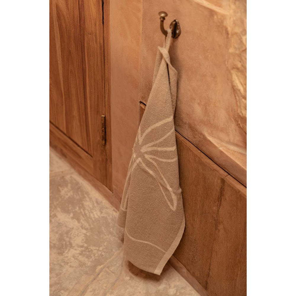 Natural white linen kitchen towel with palm tree print