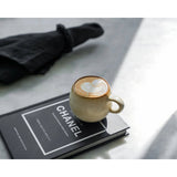 Beige stoneware espresso cup
