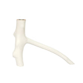 White ceramic vase with a long, thin neck and wide base on a white background