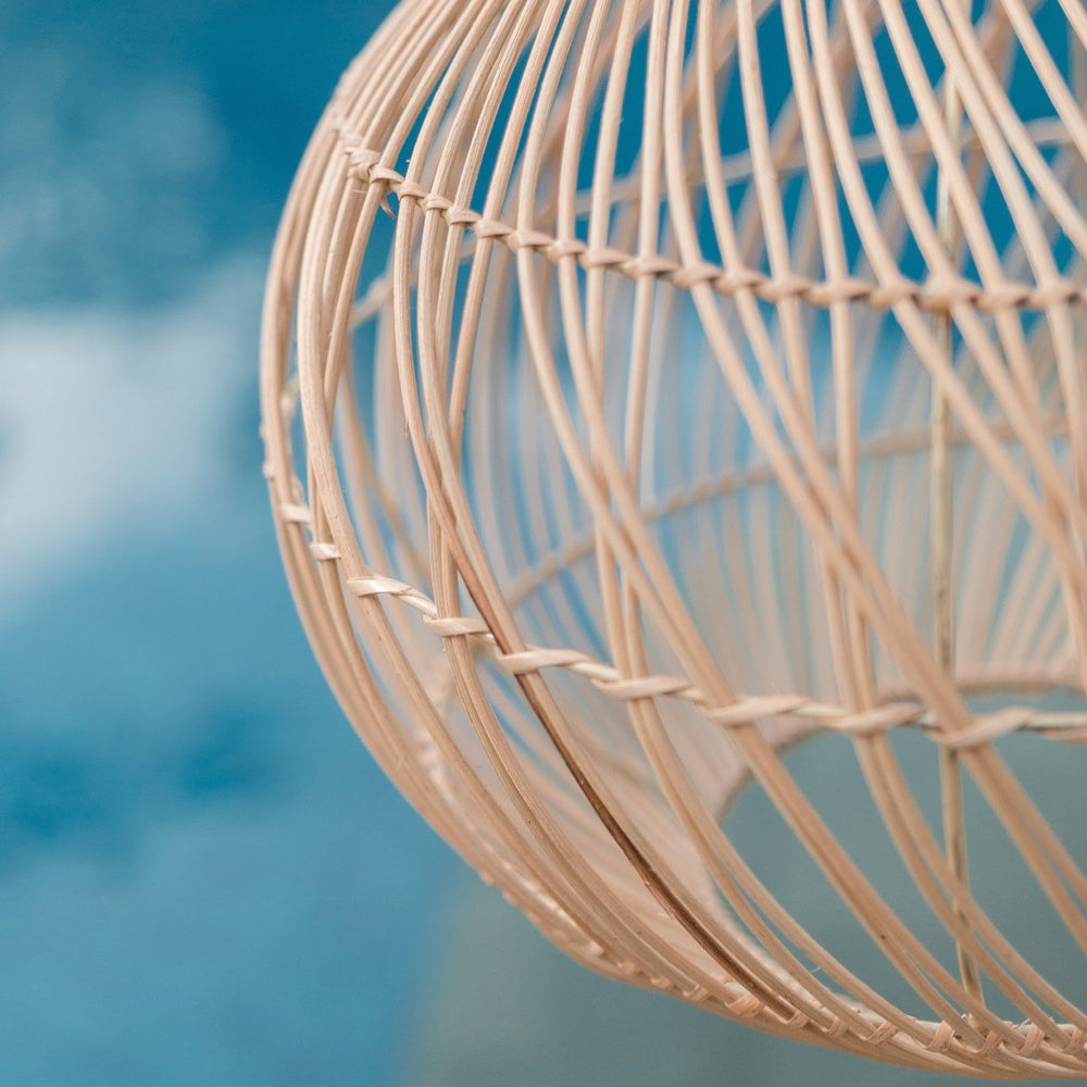 Beige rattan pendant lamp with braided boho design