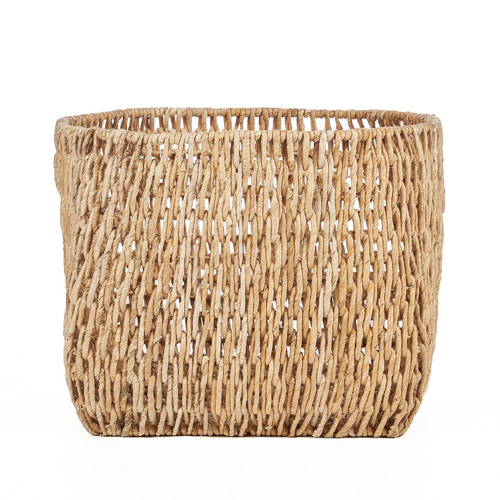 Natural palm leaf basket on a white background