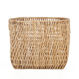 Natural palm leaf basket on a white background