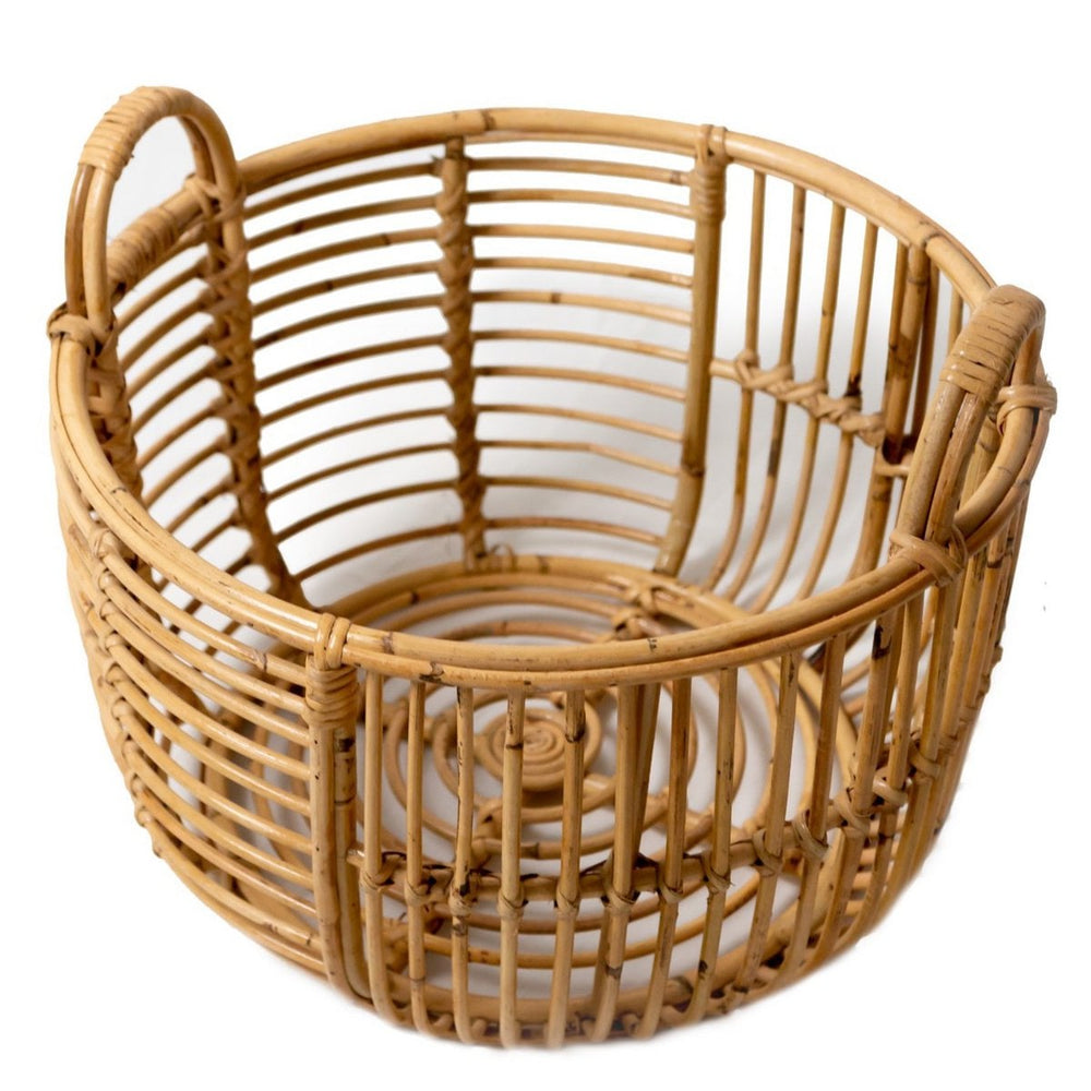 Beige woven rattan laundry basket with handles
