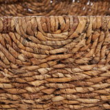 Brown woven palm leaf storage basket with handles