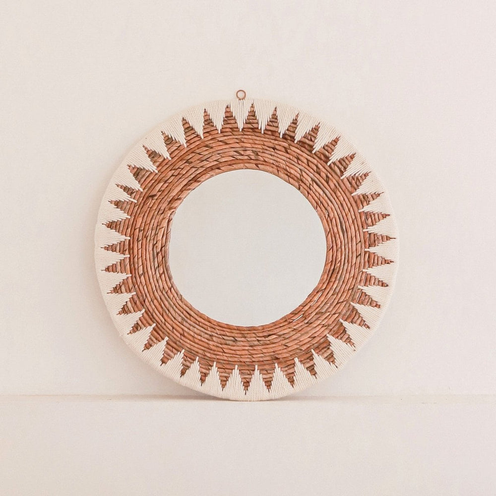 Round woven banana fibre wall mirror with white cotton pattern
