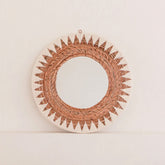 Round woven banana fibre wall mirror with white cotton pattern