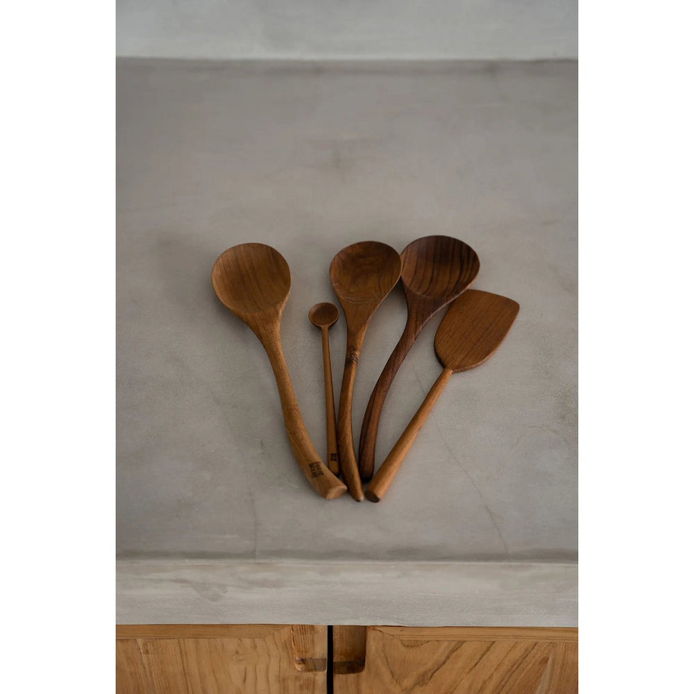 Brown teak root wooden spoon