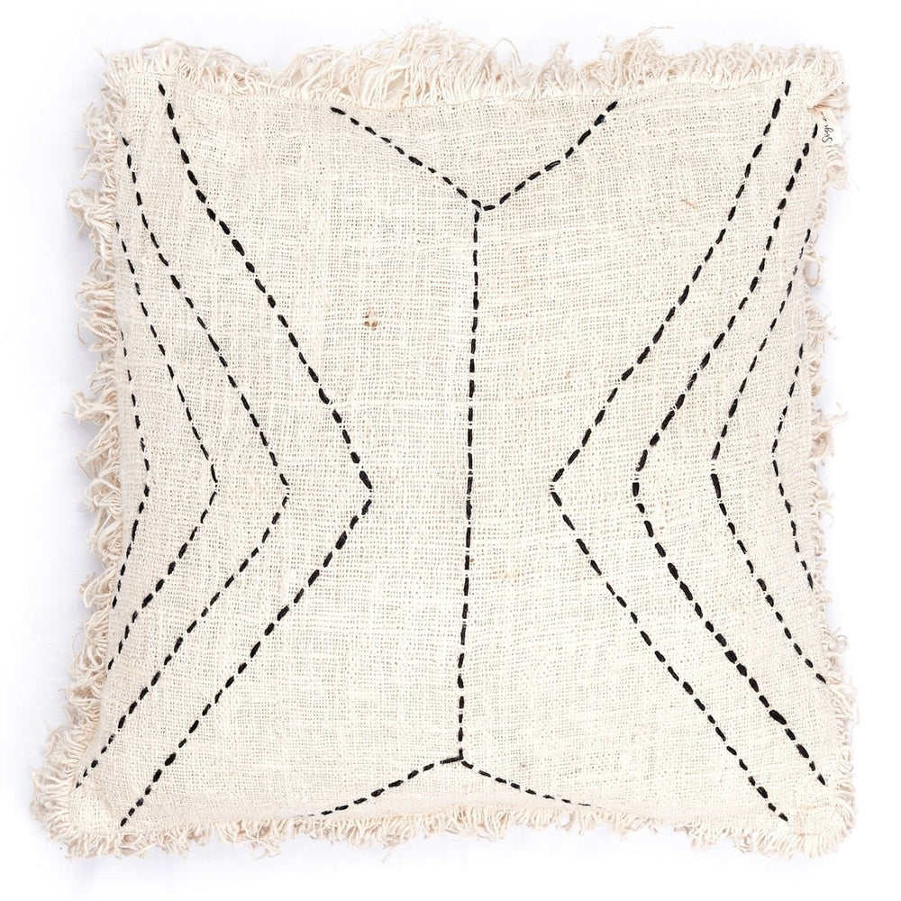 Beige cushion with black zigzag stitching on a white background