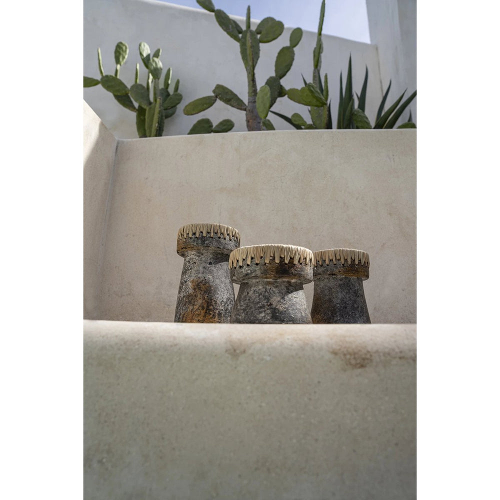 Antique grey terracotta candle holder with raffia accent