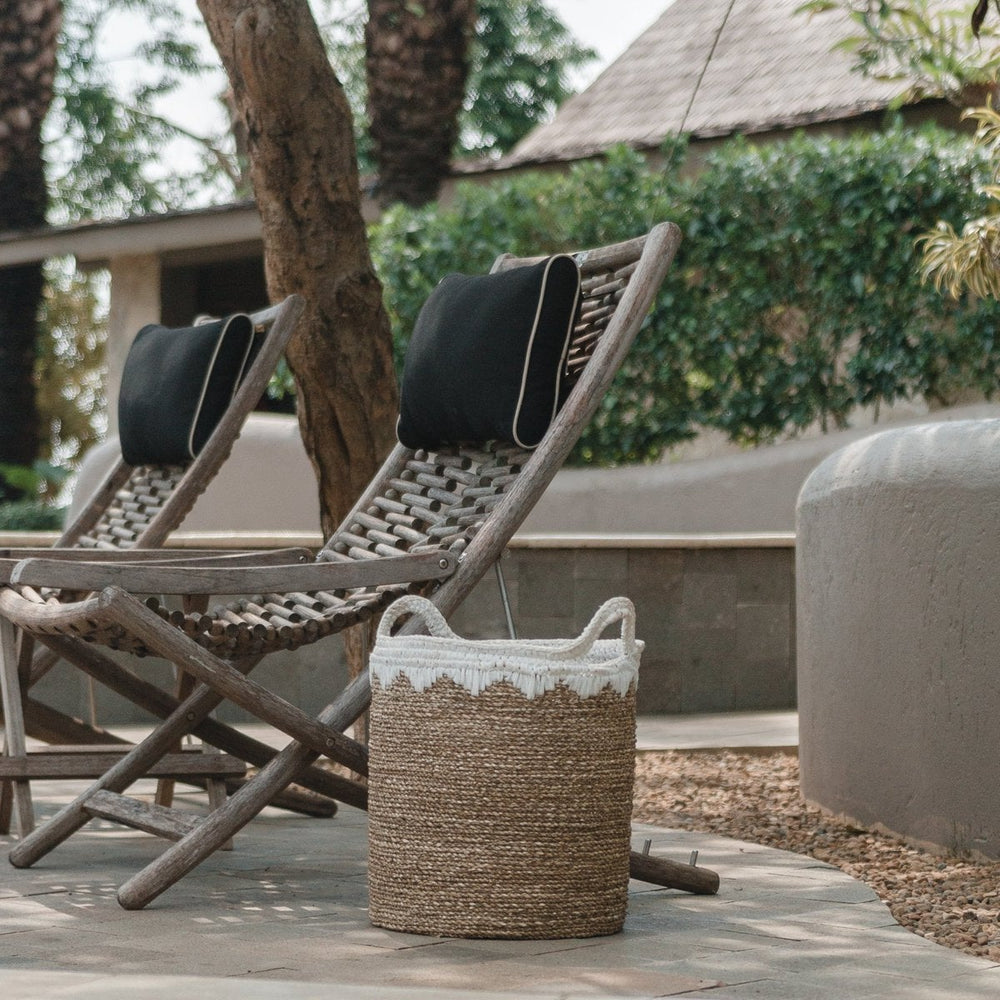 White woven seagrass storage basket with handles