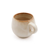 Beige stoneware espresso cup
