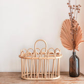 Beige rattan newspaper basket with two compartments