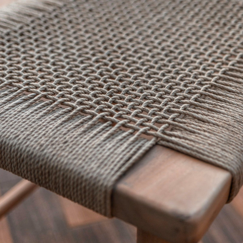 Beige wooden stool with woven recycled paper seat