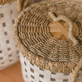 White woven bamboo laundry basket with seagrass lid