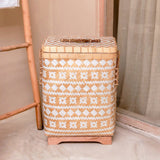 Beige white handwoven bamboo laundry basket with lid
