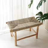 Beige wood bench with woven seagrass seat