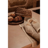 Natural white linen kitchen towel with palm tree print