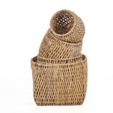 Natural palm leaf basket on a white background