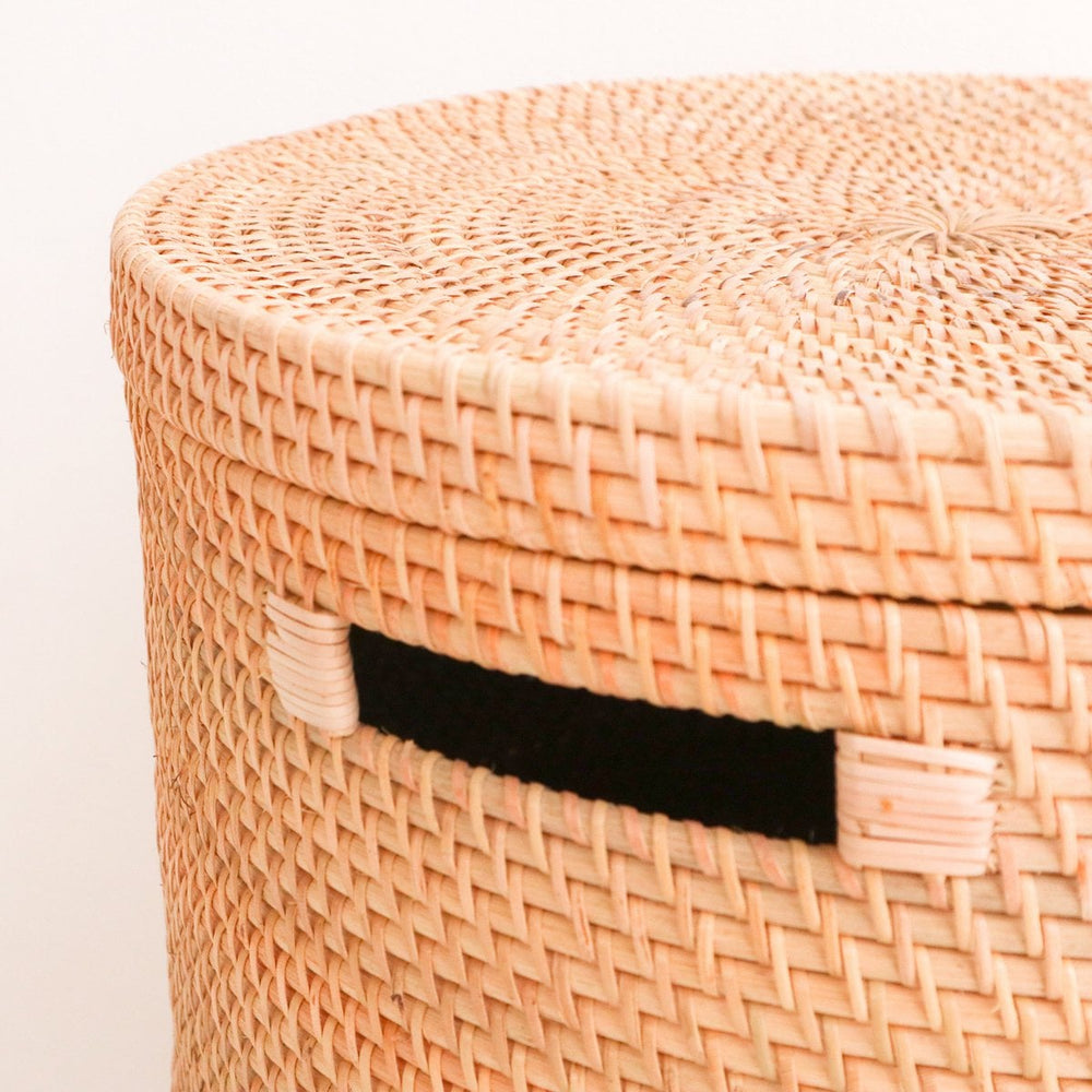 Beige woven rattan laundry basket with lid