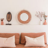Round woven banana fibre wall mirror with white cotton pattern