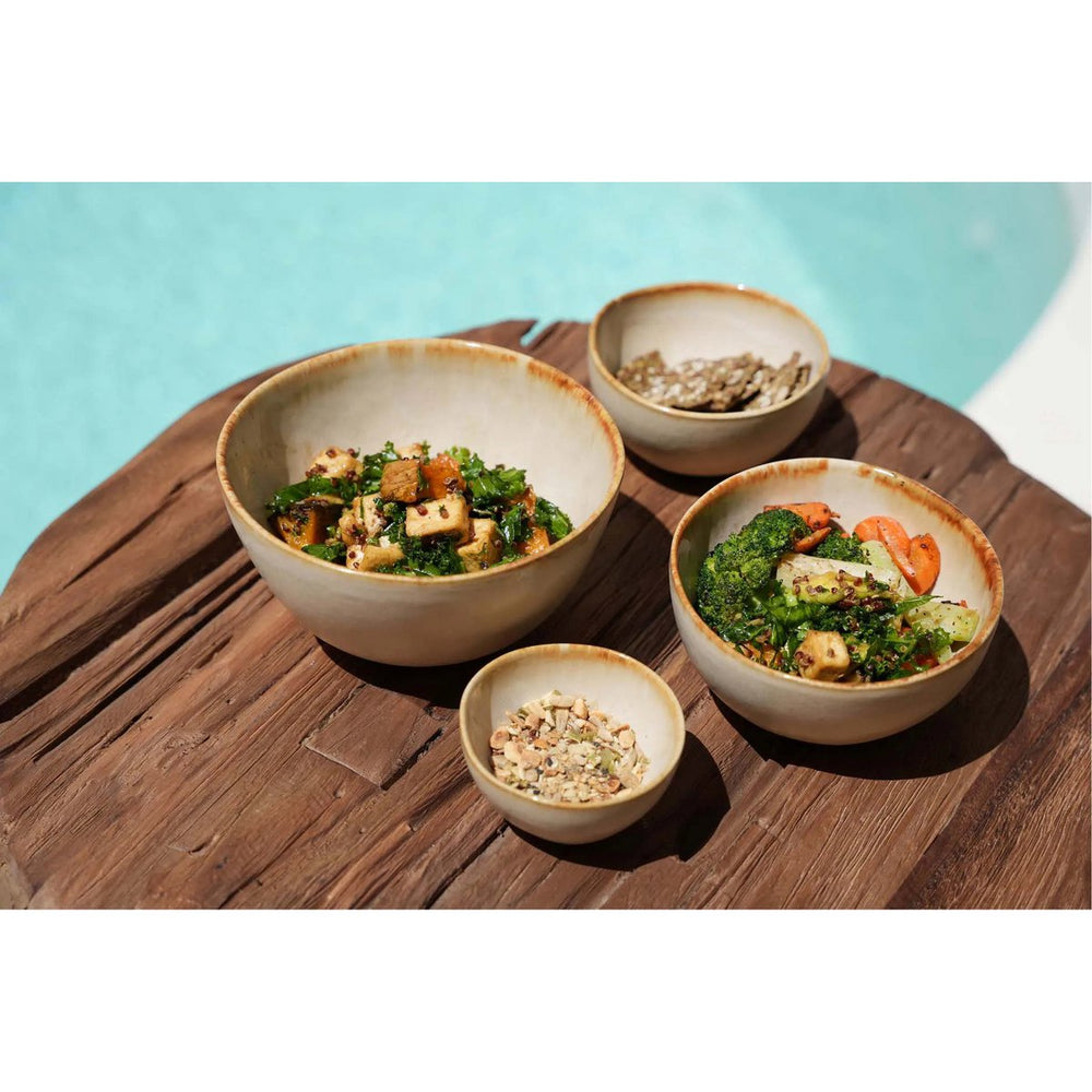 White stoneware sauce bowl with amber rim