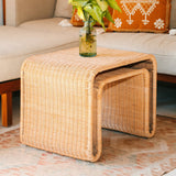 Beige rattan side table with metal frame