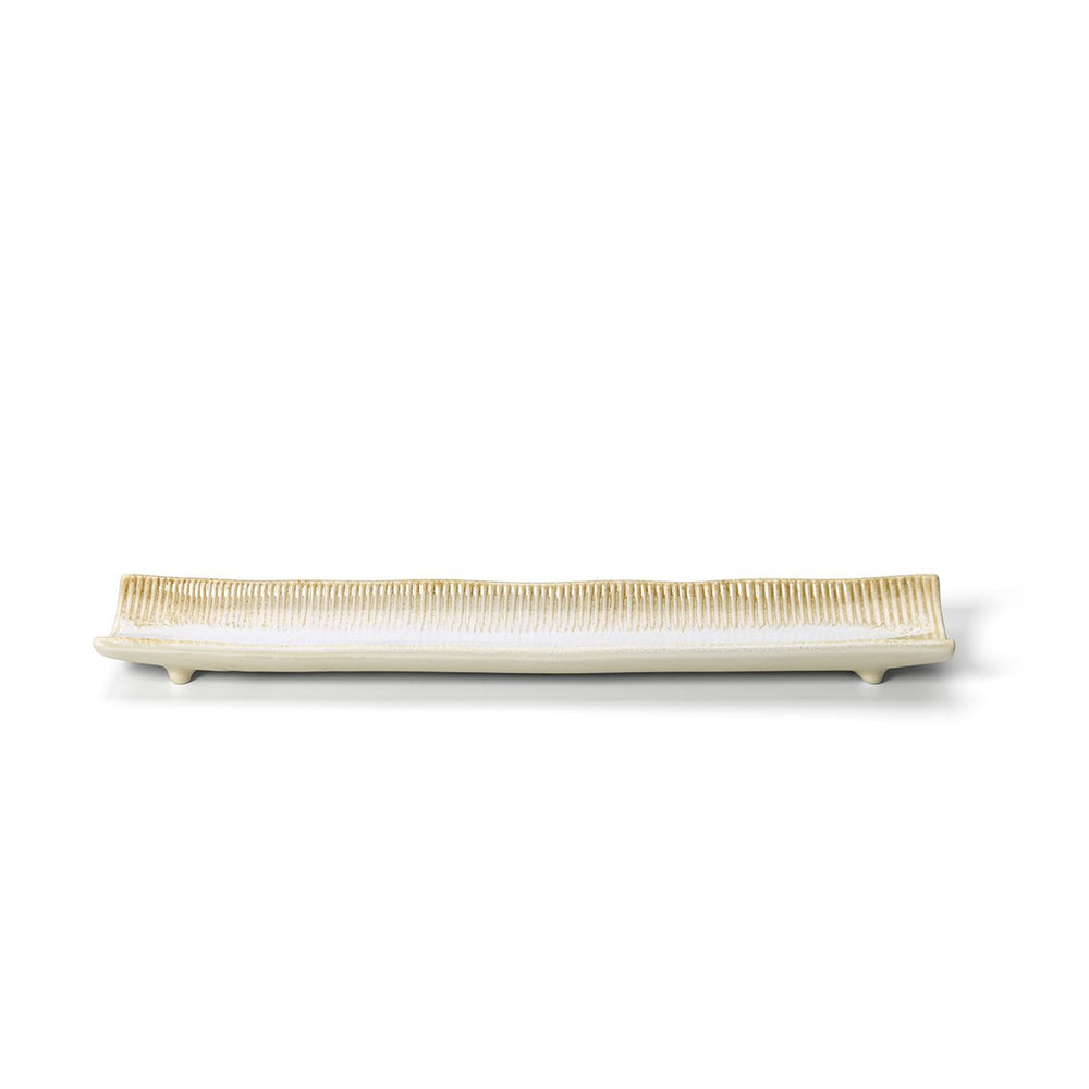 Beige long ceramic platter with white honey glaze