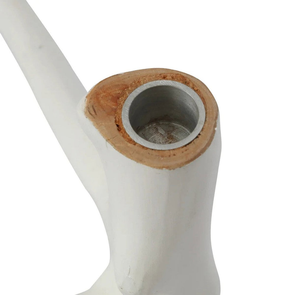 Close-up of a white ceramic vase with a wooden base on a white background