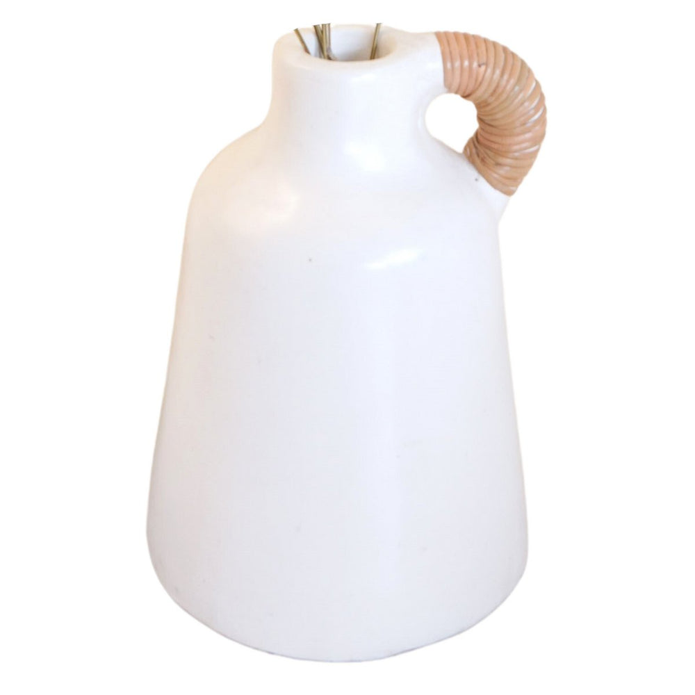 White clay vase with rattan-wrapped handle