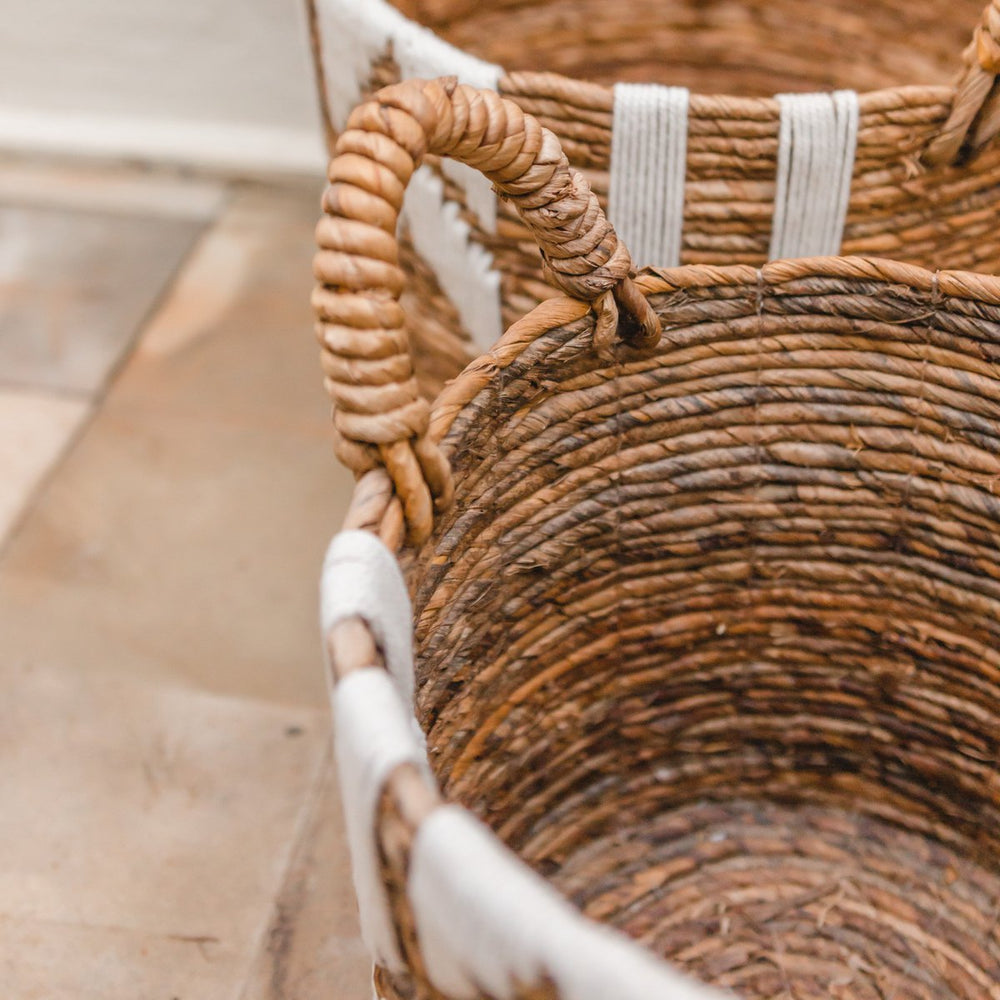 Brown banana fibre basket with white cotton macrame pattern