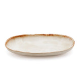 White stoneware oval plate with gold accent