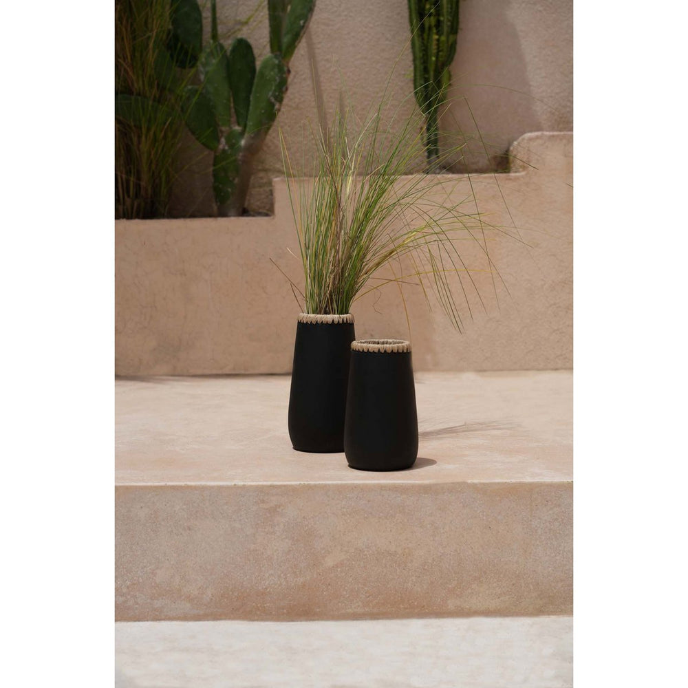 Black terracotta vase with natural raffia trim
