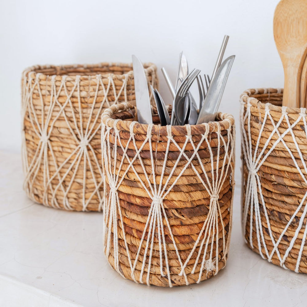 Brown and white woven banana fibre storage basket with cotton macramé lacing