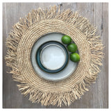 Natural raffia round placemat with fringe