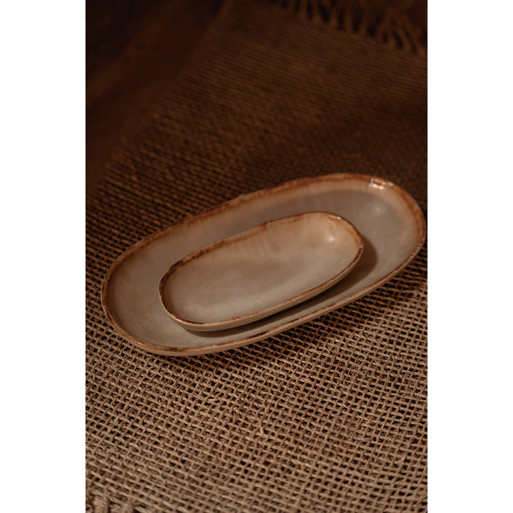 White stoneware oval plate with gold accent