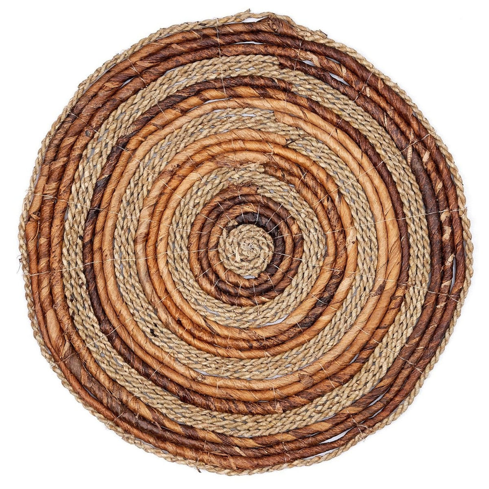 Round woven mat with brown and beige colors on a white background