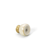 Beige ceramic sauce pourer with white honey glaze