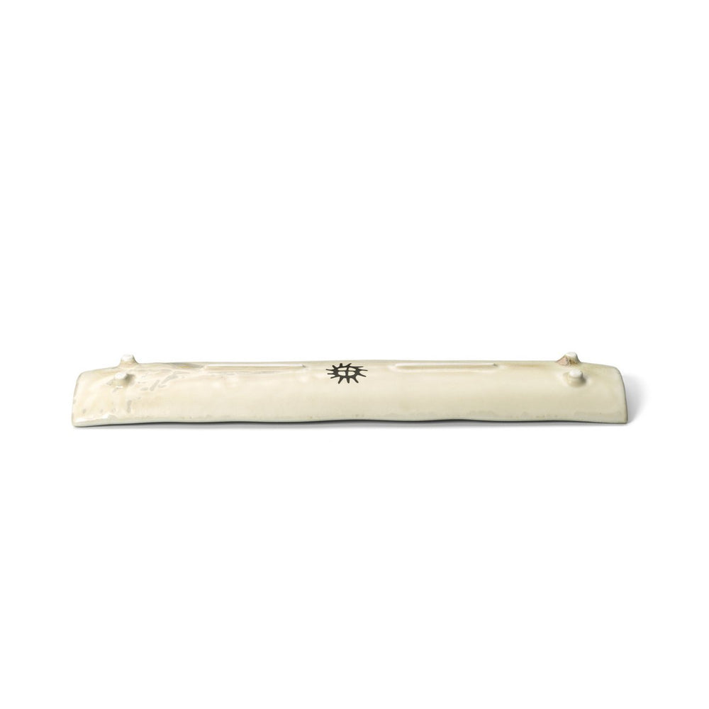 Beige long ceramic platter with white honey glaze