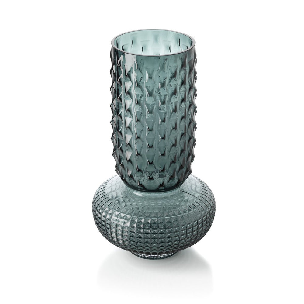 Textured glass vase on a white background